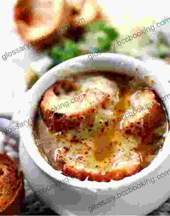 A Steaming Bowl Of French Onion Soup, With Melted Cheese And Croutons World Food: Paris: Heritage Recipes For Classic Home Cooking A Parisian Cookbook