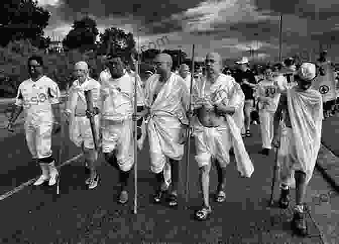 Mahatma Gandhi Leading A Satyagraha Protest, A Peaceful Demonstration Where Participants Refuse To Comply With Unjust Laws Gandhi: The Peaceful Protester (Show Me History )