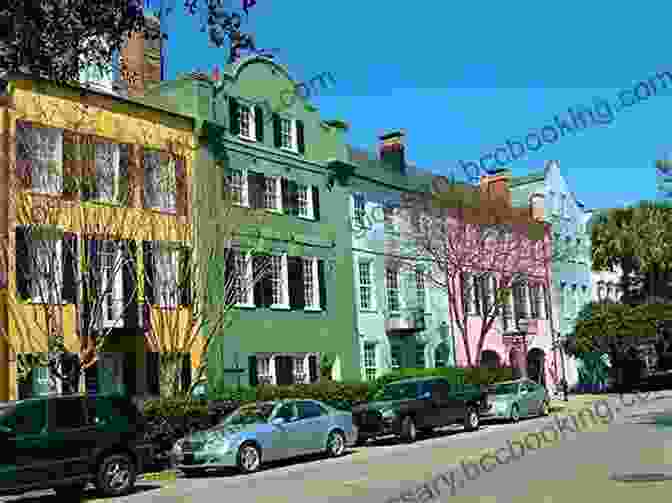 Panoramic View Of Rainbow Row, A Row Of Colorful Historic Houses In Charleston's Historic District, With Palm Trees And A Clear Blue Sky. A Short History Of Charleston